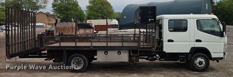 image for item EI8999 2019 Mitsubishi Fuso FE160 Crew Cab flatbed truck