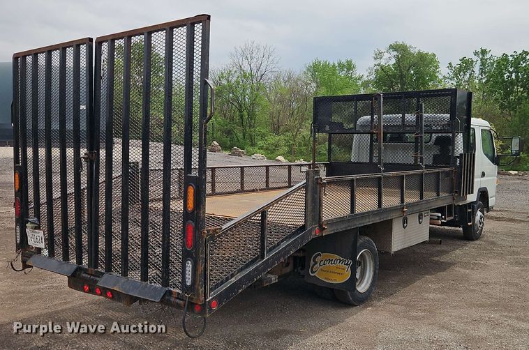 image for item EI8999 2019 Mitsubishi Fuso FE160 Crew Cab flatbed truck