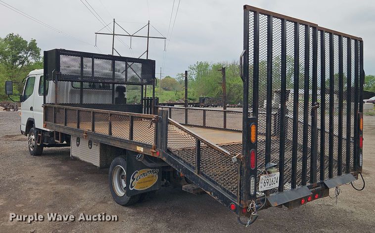 image for item EI8999 2019 Mitsubishi Fuso FE160 Crew Cab flatbed truck