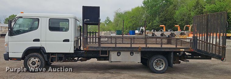 image for item EI8999 2019 Mitsubishi Fuso FE160 Crew Cab flatbed truck