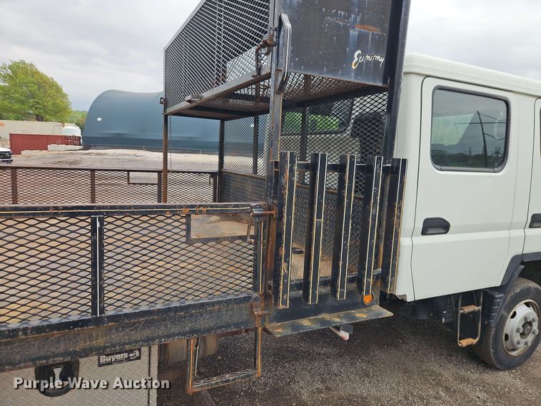 image for item EI8999 2019 Mitsubishi Fuso FE160 Crew Cab flatbed truck