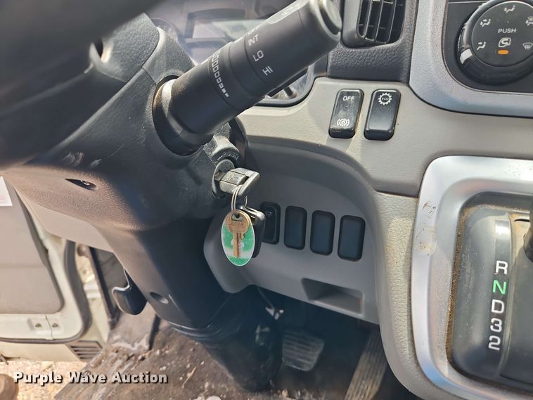 image for item EI8999 2019 Mitsubishi Fuso FE160 Crew Cab flatbed truck