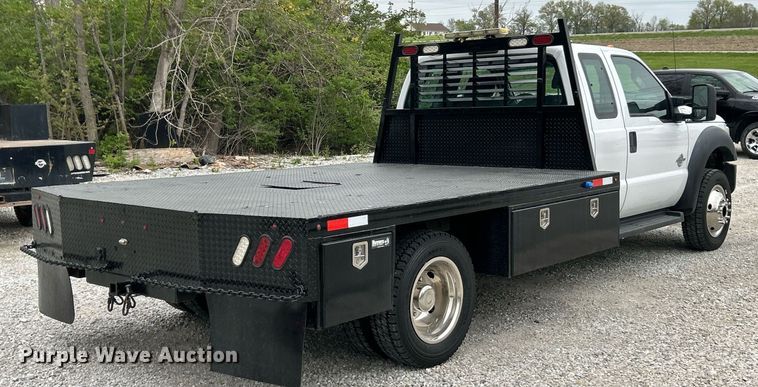 image for item EK2948 2015 Ford F550 Super Duty SuperCab flatbed truck