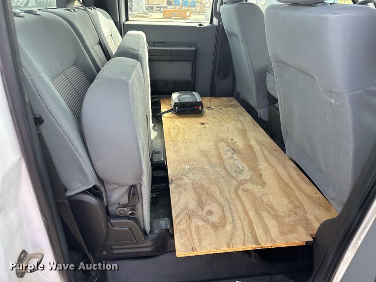 image for item EQ1402 2016 Ford F250 Super Duty  Crew Cab utility bed pickup truck