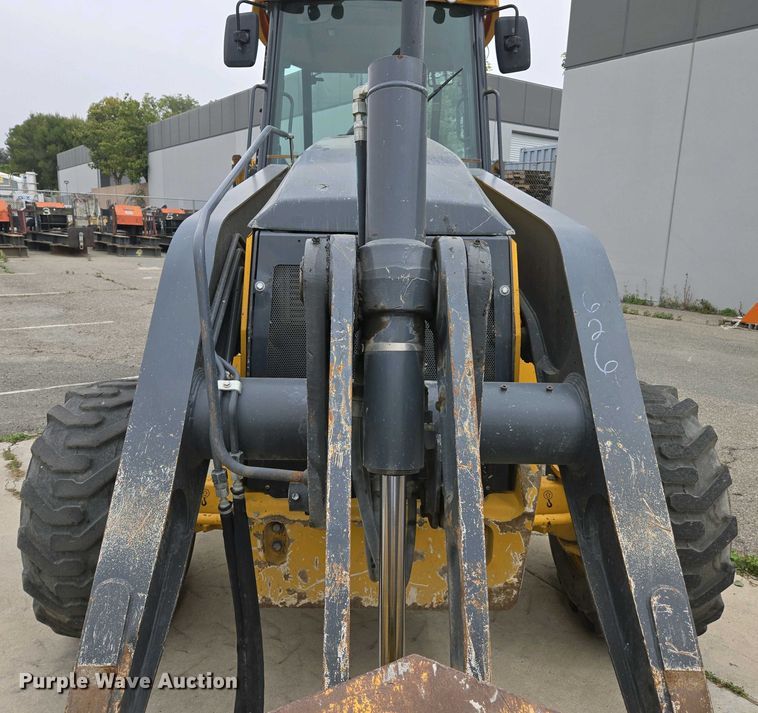 image for item EC0956 2020 John Deere 710L backhoe