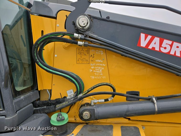 image for item EC0956 2020 John Deere 710L backhoe