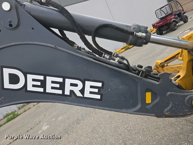 image for item EC0956 2020 John Deere 710L backhoe