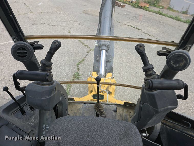 image for item EC0956 2020 John Deere 710L backhoe