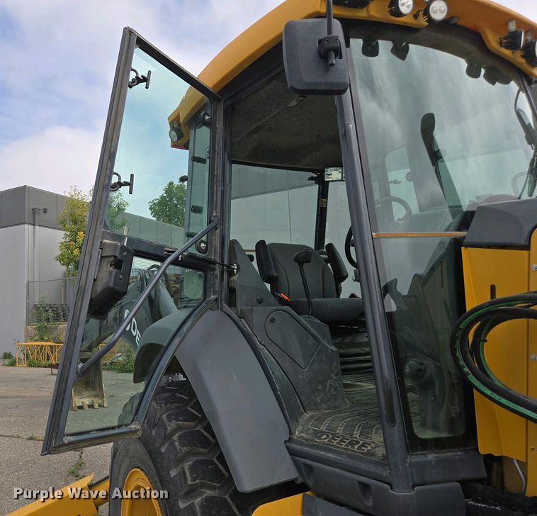 image for item EC0956 2020 John Deere 710L backhoe