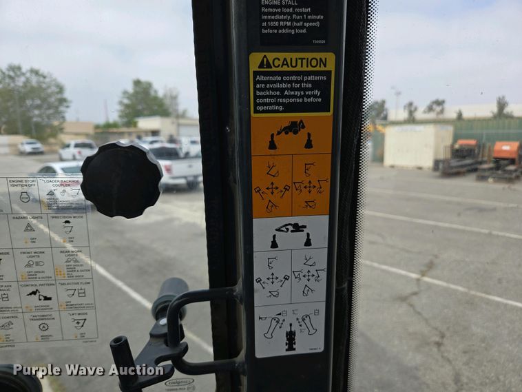 image for item EC0956 2020 John Deere 710L backhoe