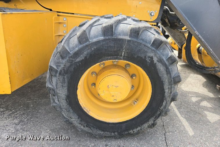 image for item EC0956 2020 John Deere 710L backhoe