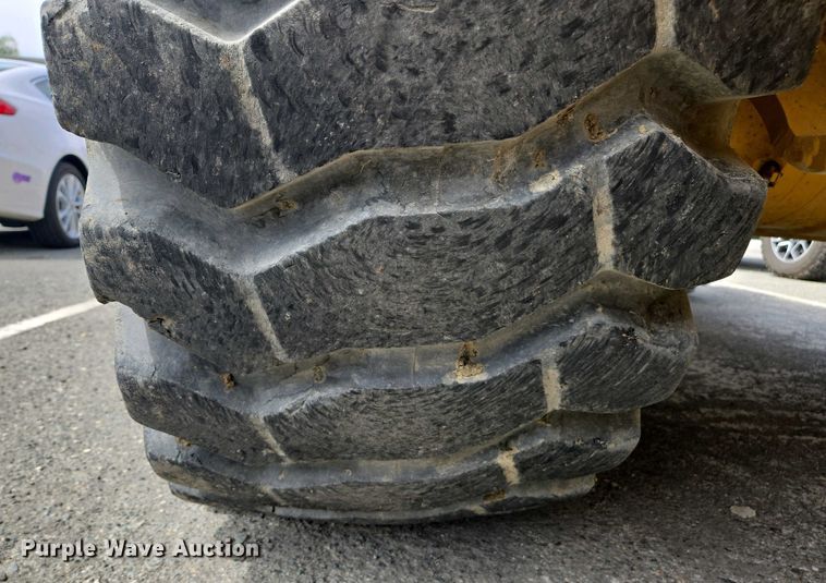 image for item EC0956 2020 John Deere 710L backhoe