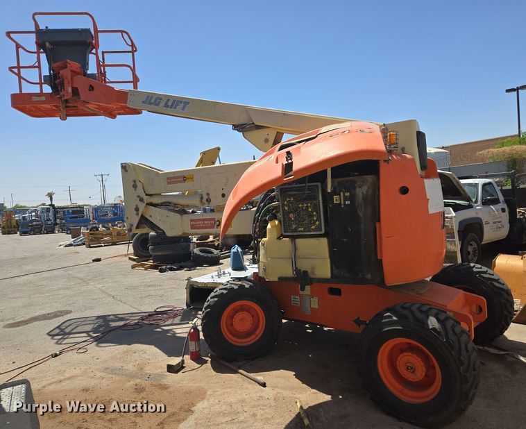 image for item EC0987 1999 JLG 450A boom lift