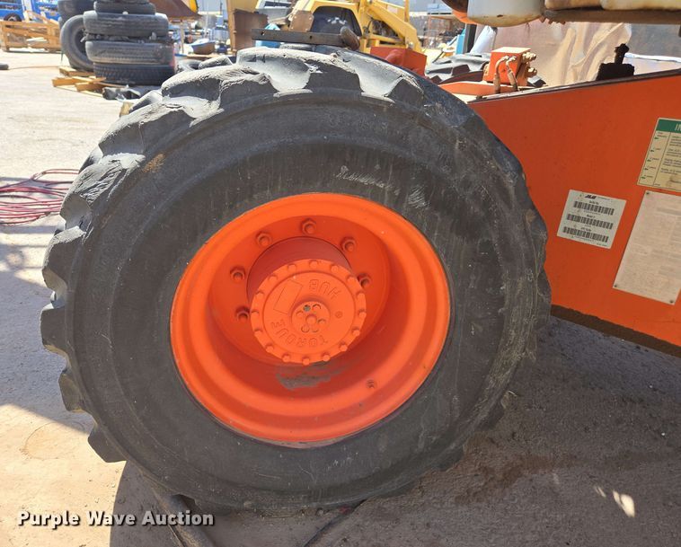 image for item EC0987 1999 JLG 450A boom lift