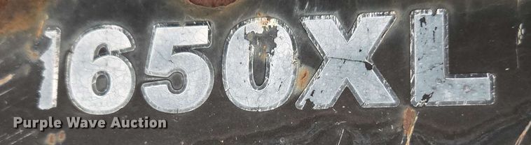 image for item EC1006 Caterpillar 1650XL backhoe auger