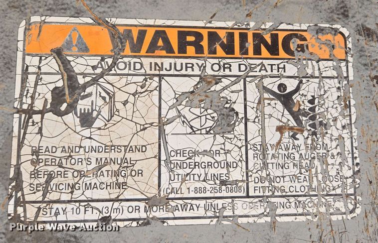 image for item EC1006 Caterpillar 1650XL backhoe auger