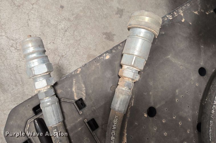 image for item EC1006 Caterpillar 1650XL backhoe auger