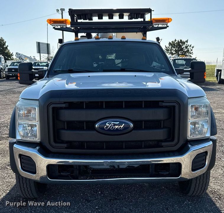 image for item EG5747 2011 Ford F550 Super Duty Crew Cab flatbed pickup truck