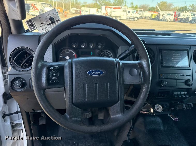 image for item EG5747 2011 Ford F550 Super Duty Crew Cab flatbed pickup truck