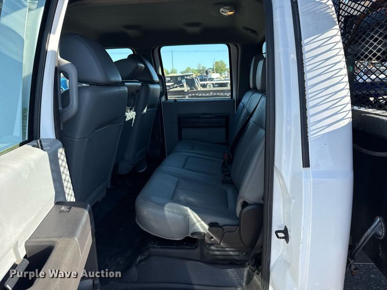 image for item EG5747 2011 Ford F550 Super Duty Crew Cab flatbed pickup truck