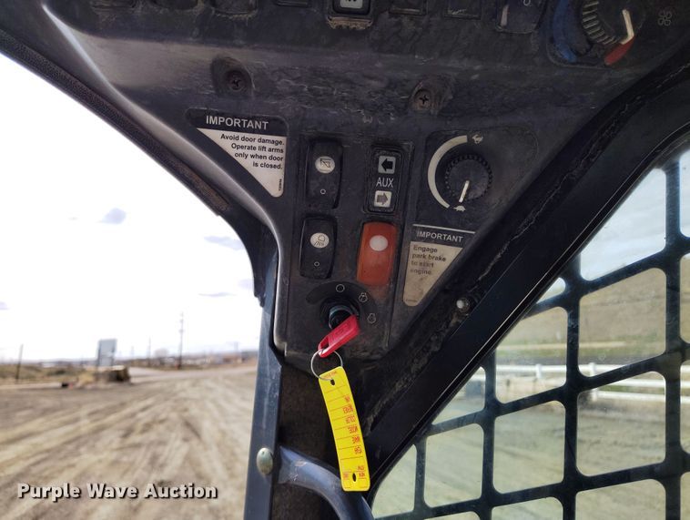 image for item EH0235 2012 John Deere 323D tracked skid steer loader