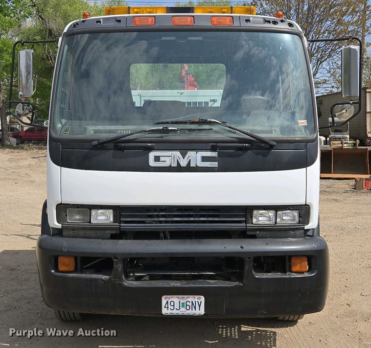 image for item EM7055 1999 GMC T7500 utility / service truck