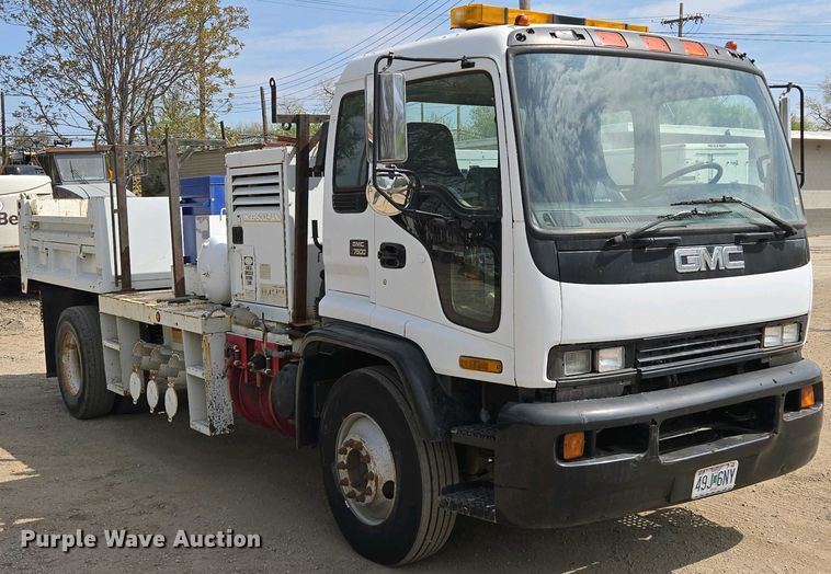 image for item EM7055 1999 GMC T7500 utility / service truck