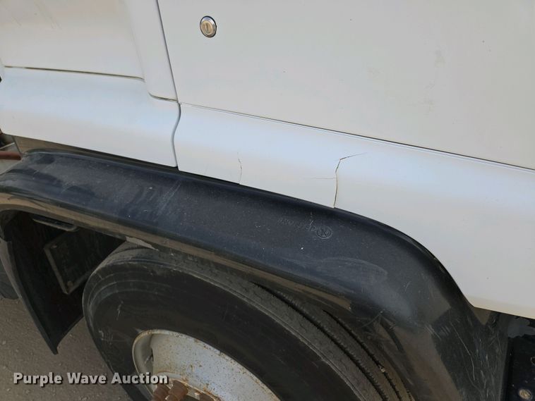 image for item EM7055 1999 GMC T7500 utility / service truck