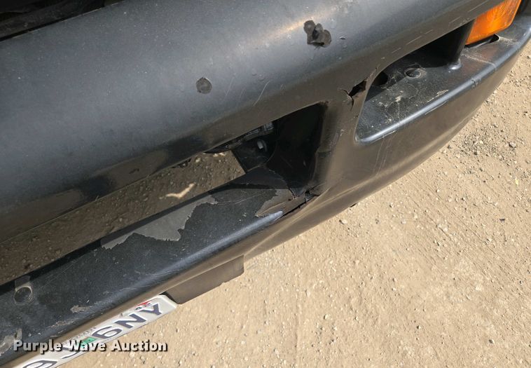 image for item EM7055 1999 GMC T7500 utility / service truck