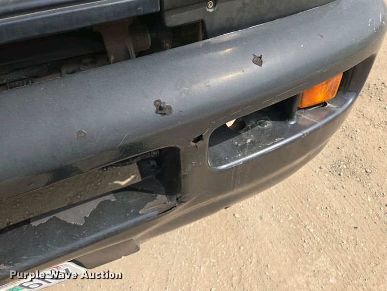 image for item EM7055 1999 GMC T7500 utility / service truck