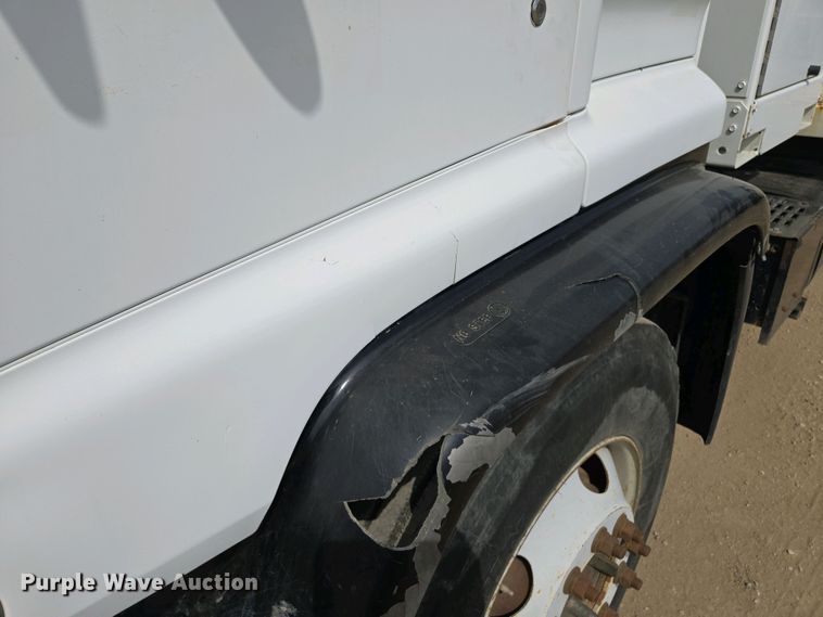 image for item EM7055 1999 GMC T7500 utility / service truck