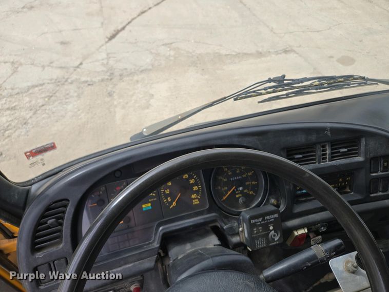 image for item EM7055 1999 GMC T7500 utility / service truck