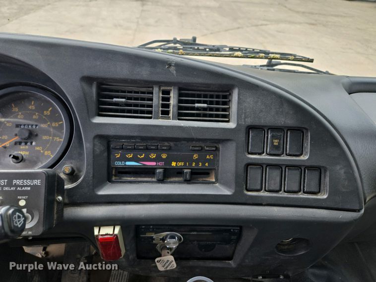 image for item EM7055 1999 GMC T7500 utility / service truck