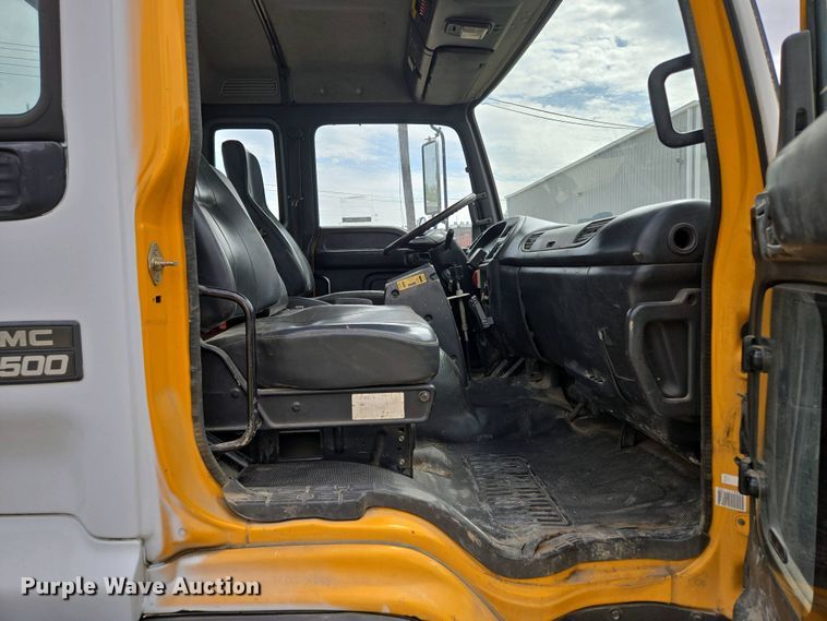 image for item EM7055 1999 GMC T7500 utility / service truck