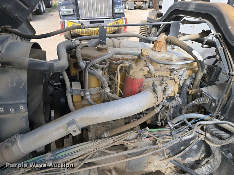 image for item EM7055 1999 GMC T7500 utility / service truck