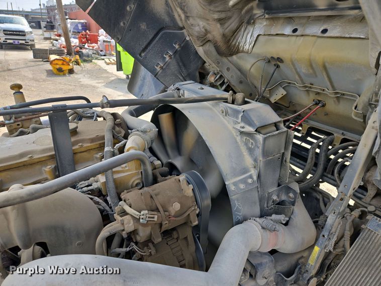 image for item EM7055 1999 GMC T7500 utility / service truck