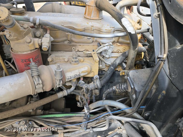 image for item EM7055 1999 GMC T7500 utility / service truck