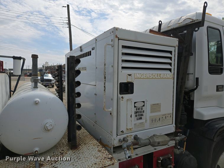 image for item EM7055 1999 GMC T7500 utility / service truck