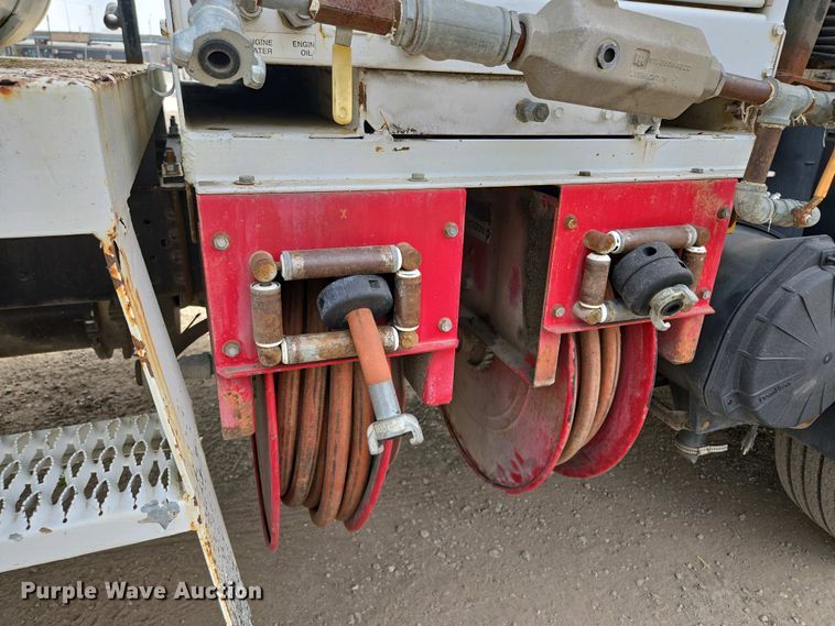 image for item EM7055 1999 GMC T7500 utility / service truck