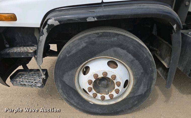 image for item EM7055 1999 GMC T7500 utility / service truck