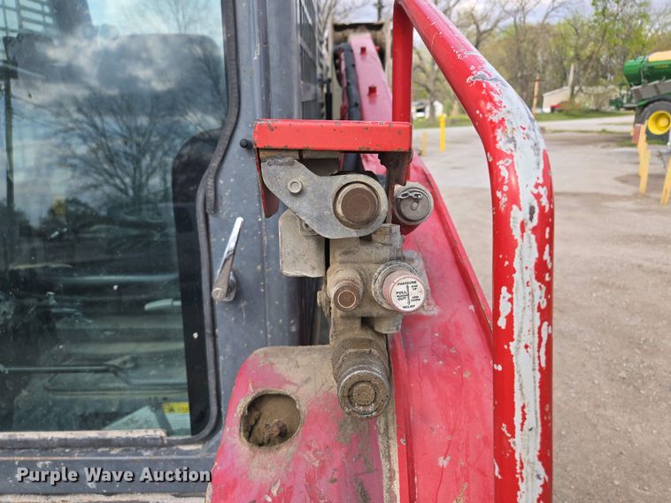 image for item EM7077 2014 Takeuchi TL12 tracked skid steer loader