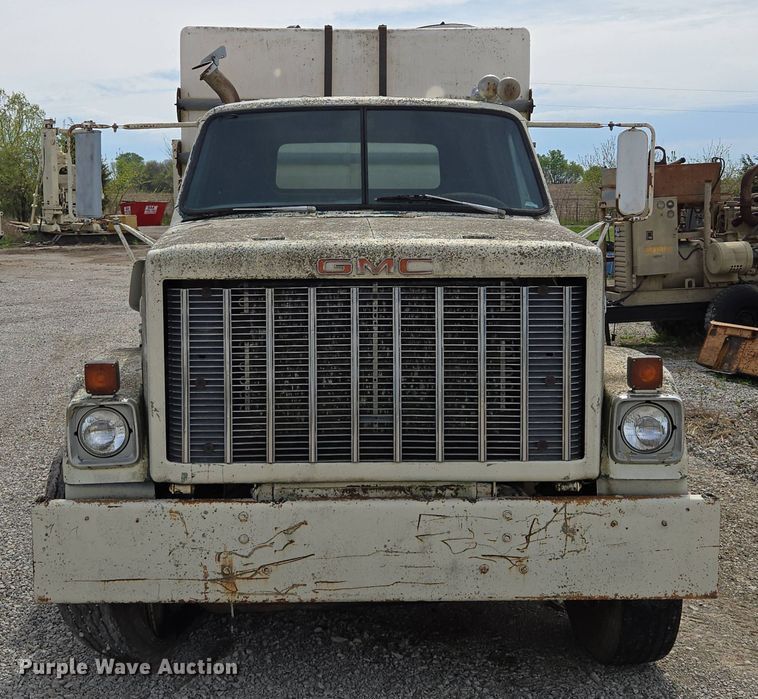 image for item EM7164 1981 GMC Brigadier flatbed truck with mud mixing system