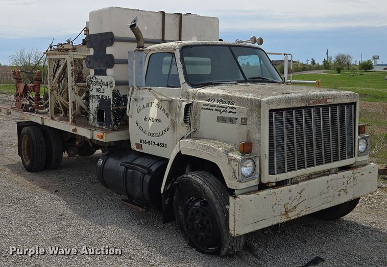 image for item EM7164 1981 GMC Brigadier flatbed truck with mud mixing system