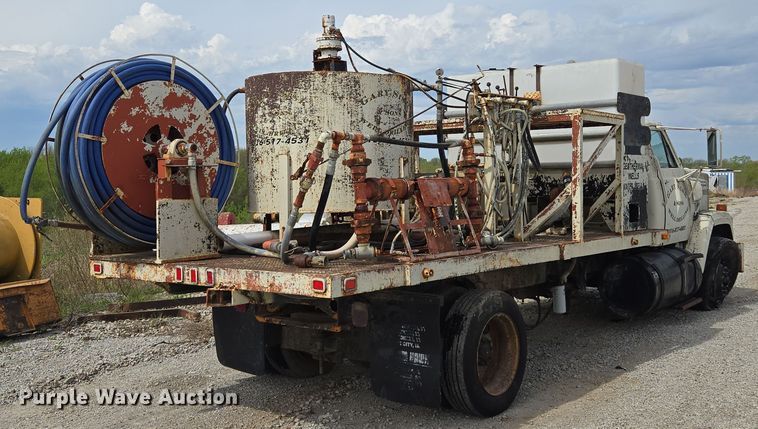 image for item EM7164 1981 GMC Brigadier flatbed truck with mud mixing system