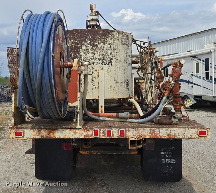 image for item EM7164 1981 GMC Brigadier flatbed truck with mud mixing system