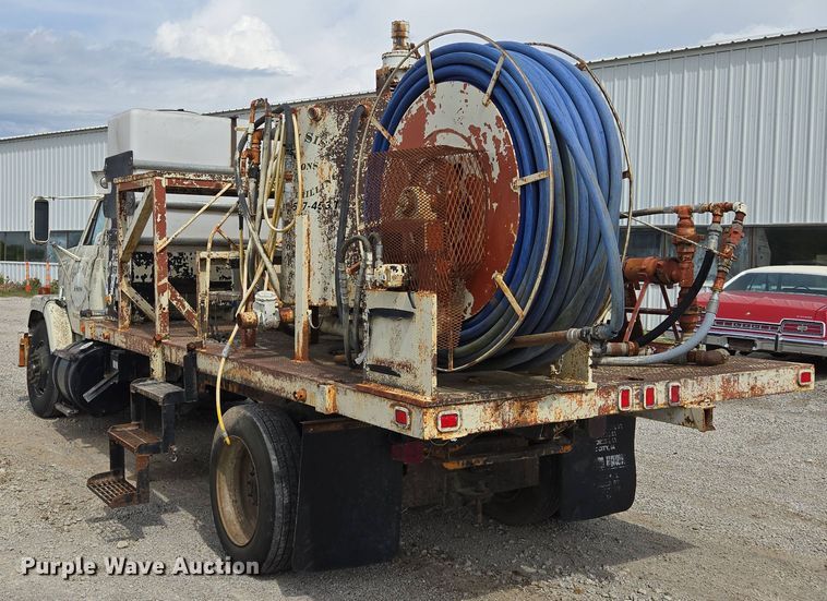 image for item EM7164 1981 GMC Brigadier flatbed truck with mud mixing system