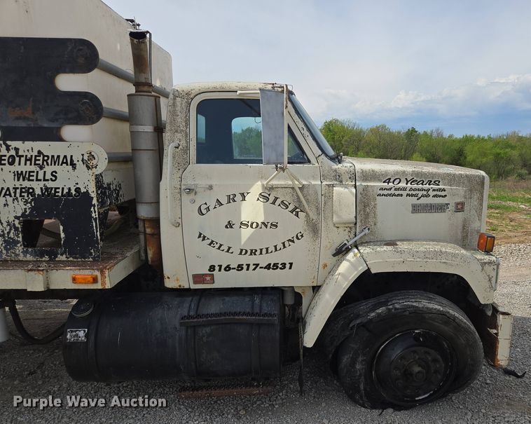 image for item EM7164 1981 GMC Brigadier flatbed truck with mud mixing system
