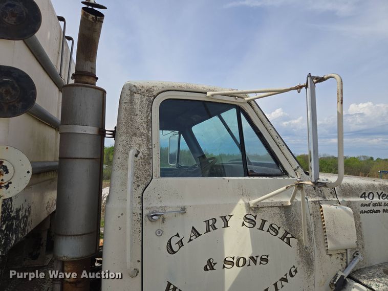 image for item EM7164 1981 GMC Brigadier flatbed truck with mud mixing system