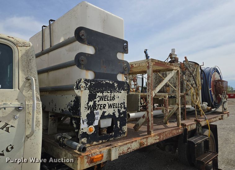 image for item EM7164 1981 GMC Brigadier flatbed truck with mud mixing system