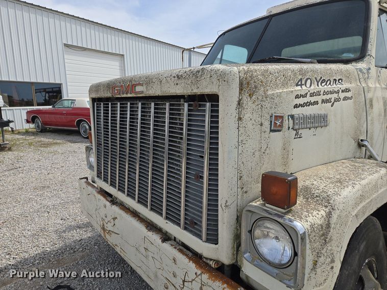 image for item EM7164 1981 GMC Brigadier flatbed truck with mud mixing system